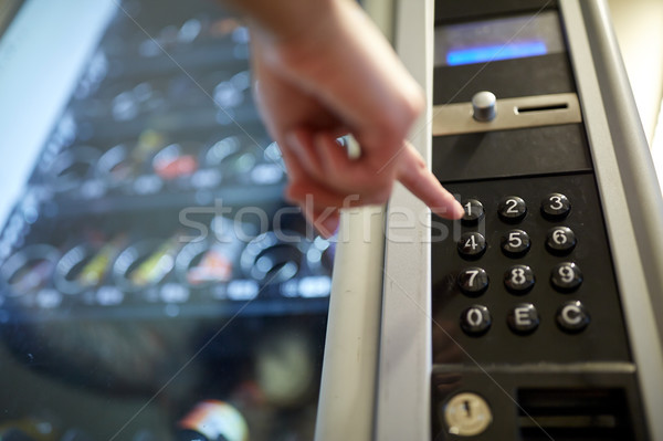 hand pushing button on vending machine keyboard Stock photo © dolgachov