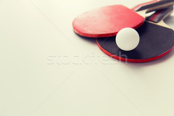 close up of table tennis rackets with ball Stock photo © dolgachov