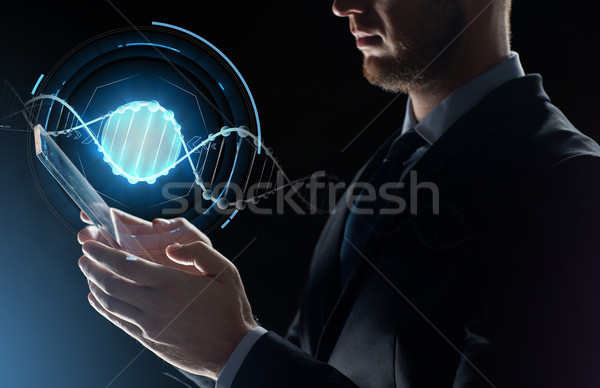 close up of businessman with transparent tablet pc Stock photo © dolgachov