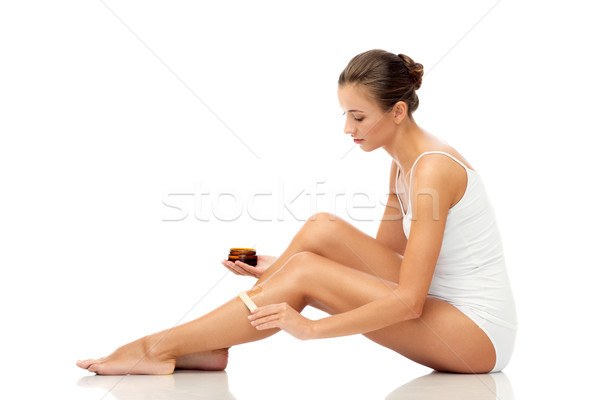 красивая женщина воск ногу красоту эпиляция Сток-фото © dolgachov