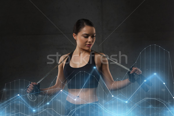 Fiatal sportos nő ugrik kötél sport Stock fotó © dolgachov
