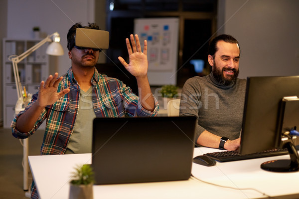 creative man in virtual reality headset at office Stock photo © dolgachov