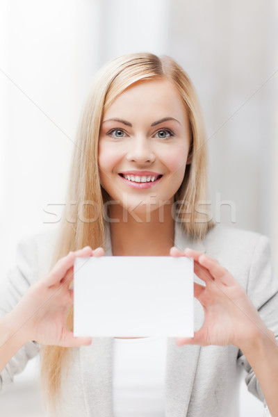 woman with blank business or name card Stock photo © dolgachov