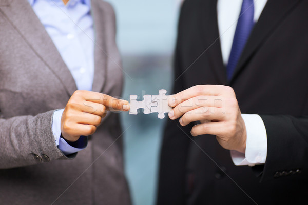 Stockfoto: Zakenman · zakenvrouw · puzzelstukjes · business · kantoor