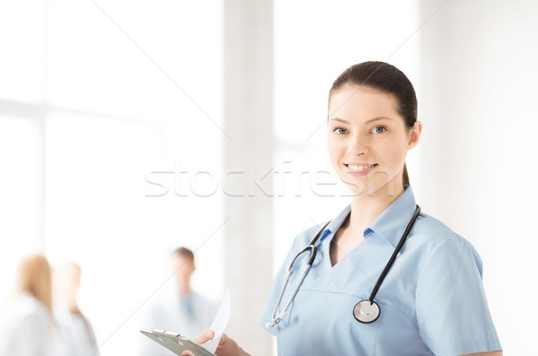 female doctor or nurse in hospital Stock photo © dolgachov