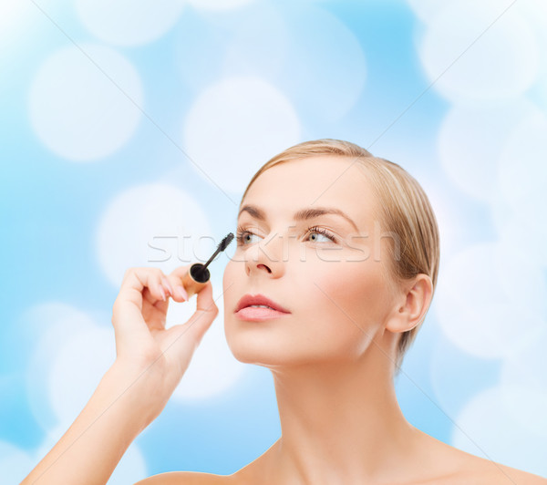 Piękna kobieta tusz do rzęs kosmetyki zdrowia piękna niebieski Zdjęcia stock © dolgachov