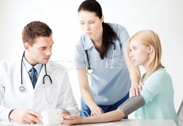 doctor and patient in hospital Stock photo © dolgachov