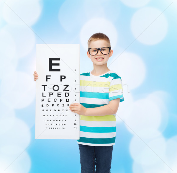 Mosolyog fiú szemüveg fehér tábla előrelátás Stock fotó © dolgachov