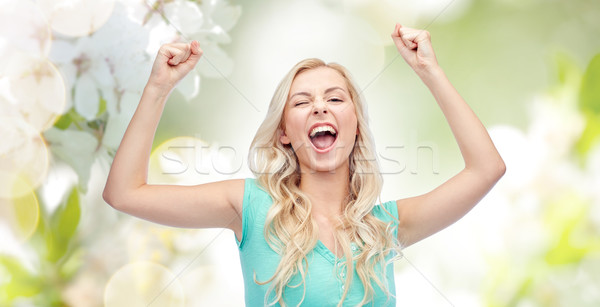 Gelukkig jonge vrouw tienermeisje vieren overwinning emoties Stockfoto © dolgachov