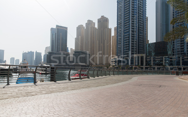 Dubai city seafront or harbor with boats Stock photo © dolgachov