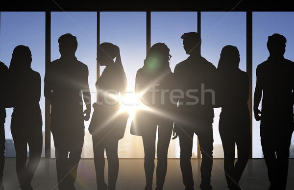 people silhouettes over office background Stock photo © dolgachov