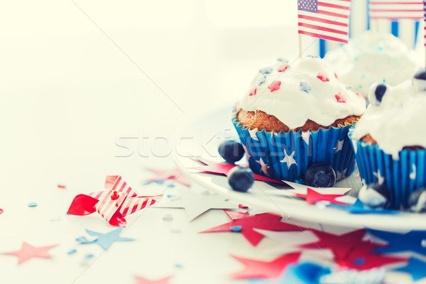 cupcakes with american flags on independence day Stock photo © dolgachov