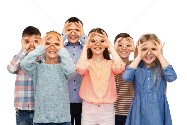 happy children making faces and having fun Stock photo © dolgachov