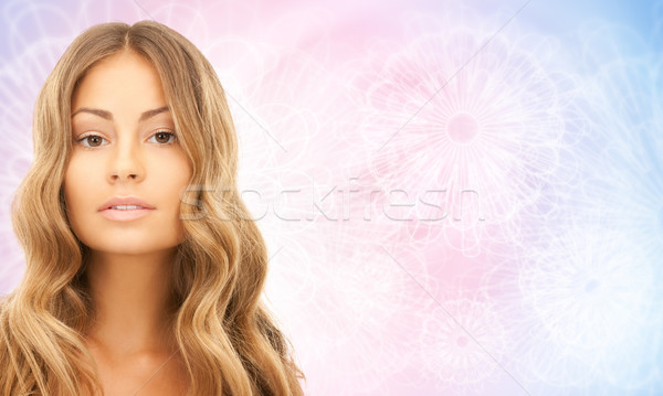 face of beautiful young happy woman with long hair Stock photo © dolgachov