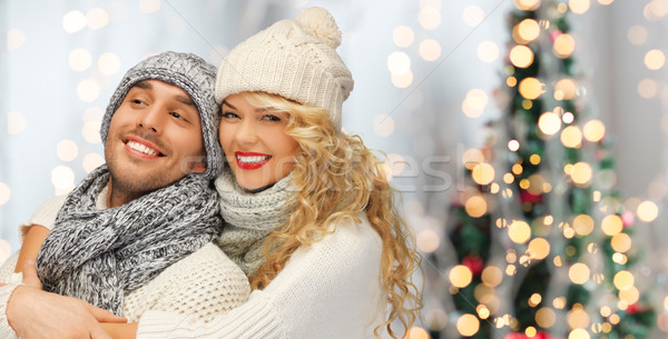 happy family couple in winter clothes hugging Stock photo © dolgachov