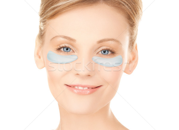 close up of woman face with under-eye patches Stock photo © dolgachov