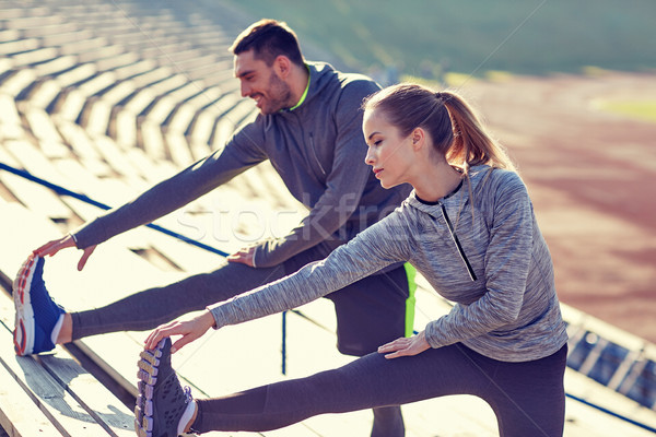 Paar Dehnung Bein Stadion Fitness Sport Stock foto © dolgachov