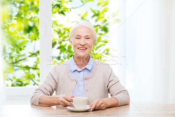 happy senior woman with cup of coffee Stock photo © dolgachov