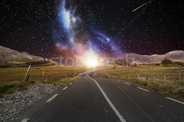 asphalt road over night sky or space Stock photo © dolgachov