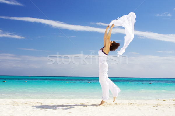 happy woman with white sarong Stock photo © dolgachov
