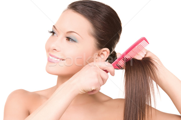 woman with comb Stock photo © dolgachov