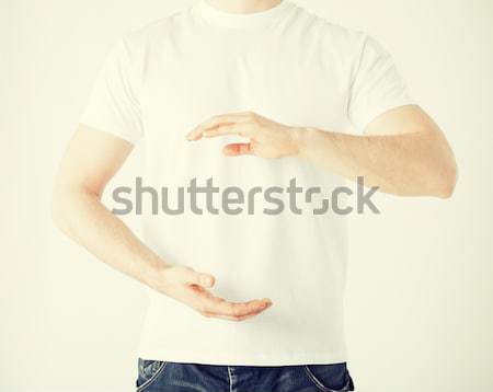 Stock photo: mans hands showing something