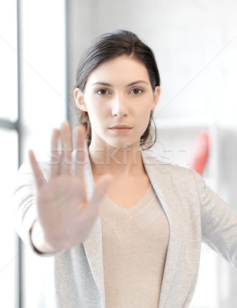 woman making stop gesture Stock photo © dolgachov