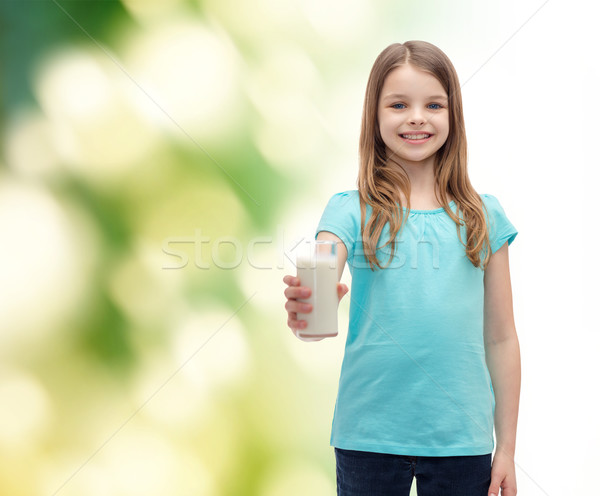 Sorridere bambina vetro latte salute bellezza Foto d'archivio © dolgachov