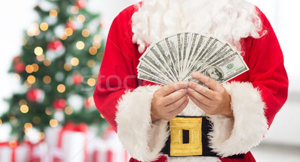 close up of santa claus with dollar money Stock photo © dolgachov