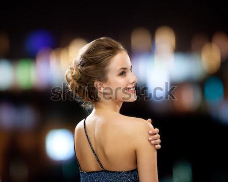 happy womani sitting in jacuzzi at poolside Stock photo © dolgachov