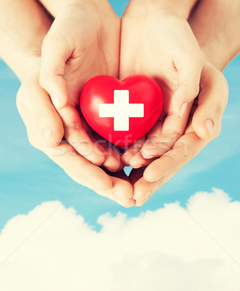 male and female hands with red heart Stock photo © dolgachov