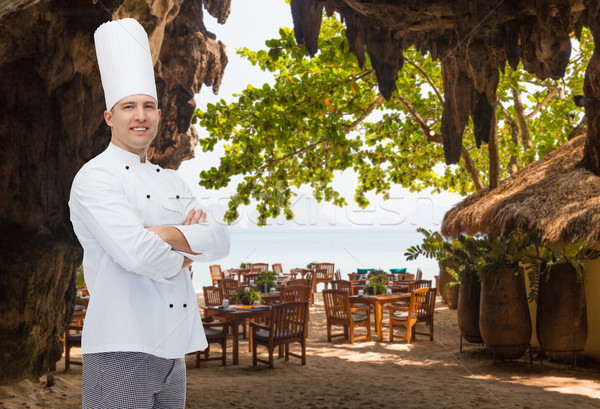 happy male chef cook with crossed hands Stock photo © dolgachov