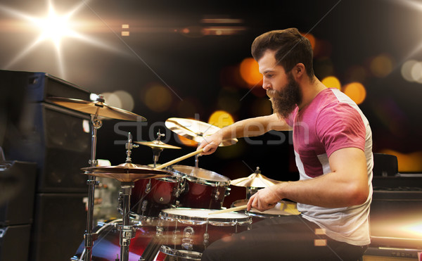 male musician playing cymbals at music concert Stock photo © dolgachov