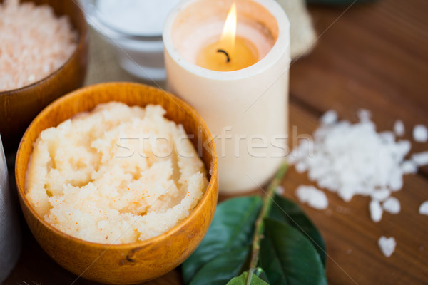 close up of natural body scrub and candle on wood Stock photo © dolgachov