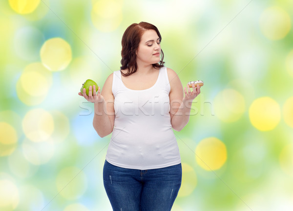 Fiatal plus size nő választ alma süti Stock fotó © dolgachov