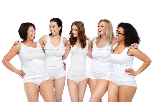 Grupo feliz diferente mulheres branco roupa interior Foto stock © dolgachov