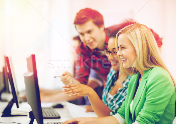 Stock photo: students with computer studying at school