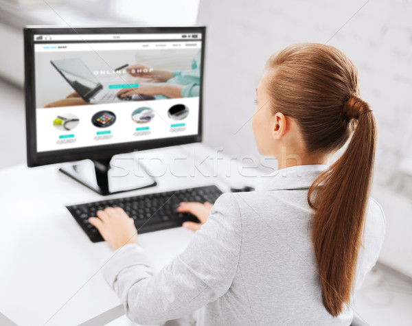 businesswoman with online shop on office computer Stock photo © dolgachov