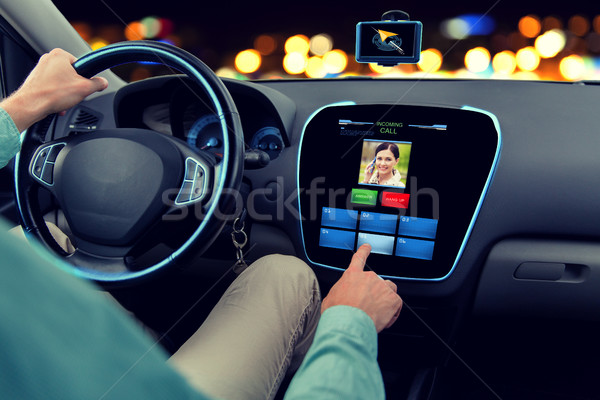 close up of man driving car and receiving call Stock photo © dolgachov
