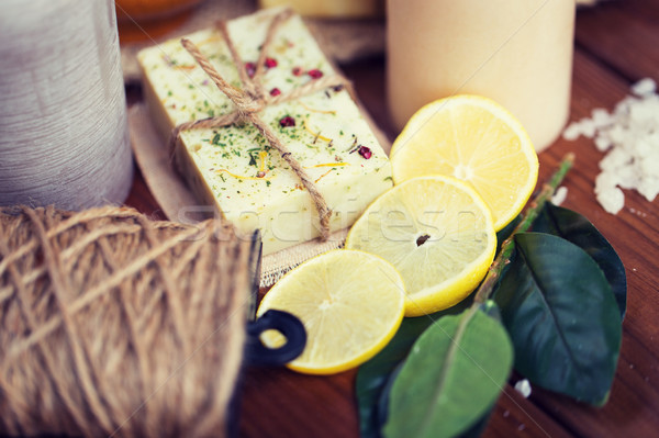 close up of natural soap and candles on wood Stock photo © dolgachov