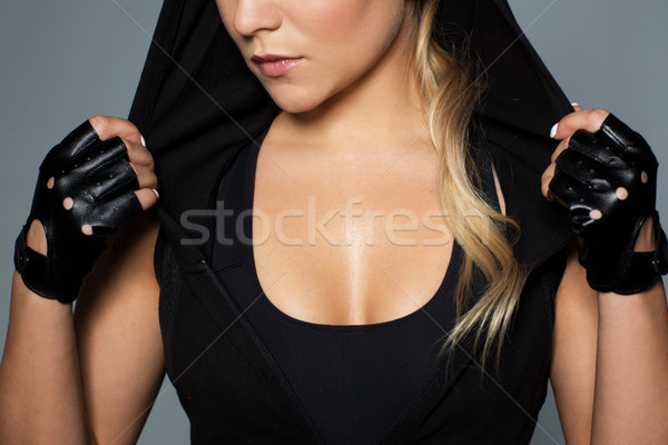 Közelkép nő fekete sportruha sport fitnessz Stock fotó © dolgachov