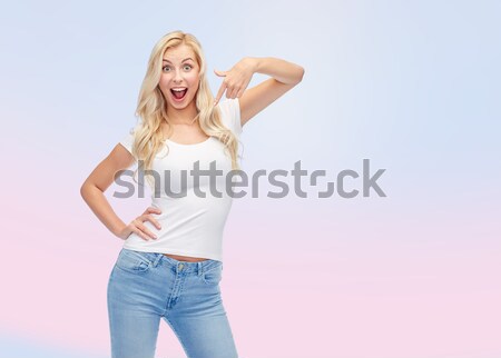 happy young woman shouting or calling someone Stock photo © dolgachov