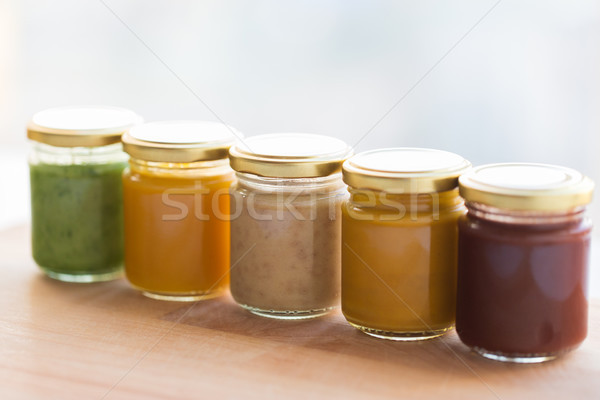 vegetable or fruit puree or baby food in jars Stock photo © dolgachov