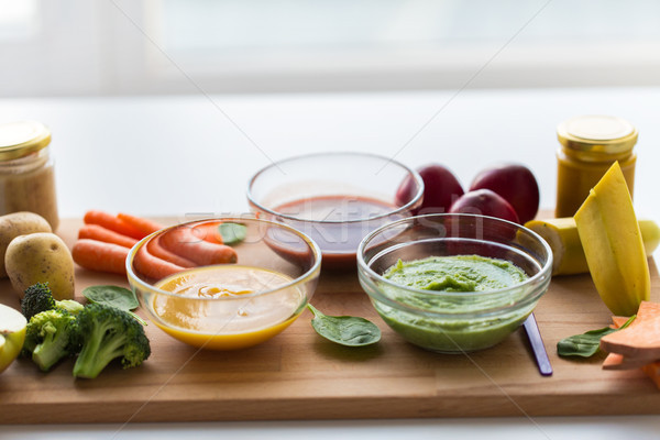 vegetable puree or baby food in glass bowls Stock photo © dolgachov