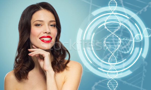 woman with red lipstick over dna molecule Stock photo © dolgachov