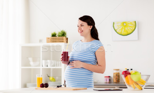 Stockfoto: Gelukkig · zwangere · vrouw · drinken · sap · home · zwangerschap