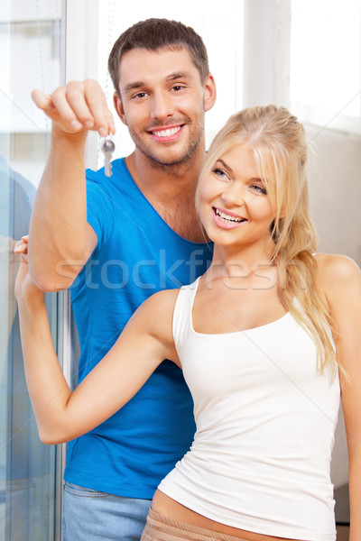 Feliz Pareja claves brillante Foto mujer Foto stock © dolgachov