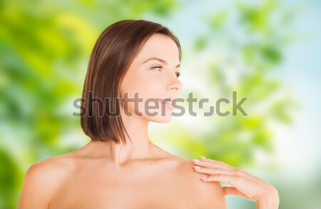 woman with green leaf Stock photo © dolgachov