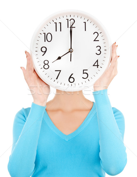 woman holding big clock Stock photo © dolgachov