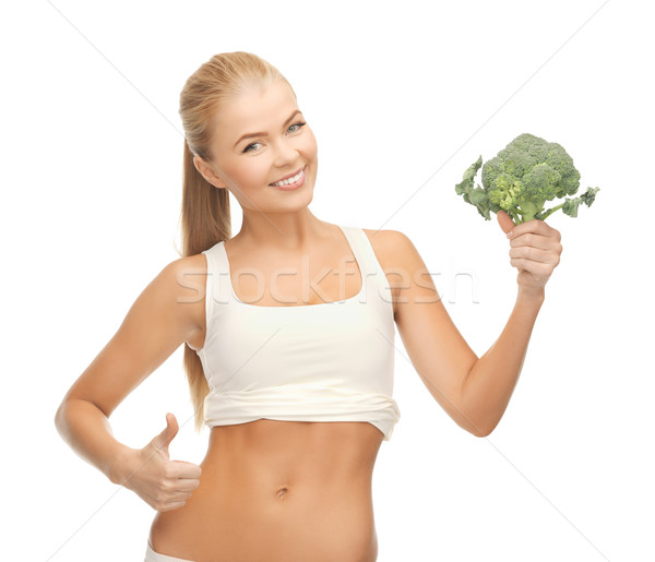 Nő mutat tart brokkoli gyönyörű nő étel Stock fotó © dolgachov